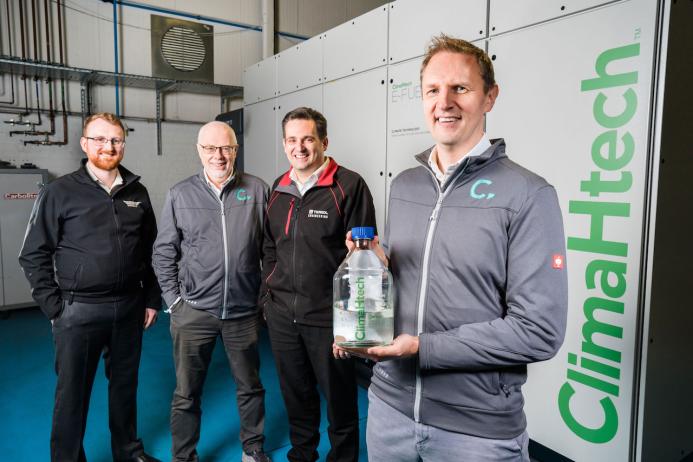 L–R: Dr Andy Harris, advanced engineering manager at Wrightbus; Prof. Roy Douglas, chief technology officer and co-founder of Catagen; David Trimble, group engineering director at Terex Materials Processing; and Dr Andrew Woods, chief executive officer and co-founder of Catagen – pictured in front of Catagen’s ClimaHtech E-Fuel GEN Reactor