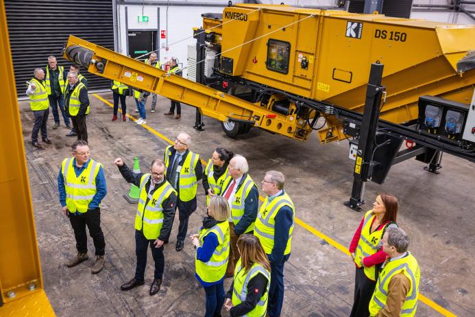 Attendees at the event being shown around Kiverco’s newly extended facilities and some of the recycling machinery on display  