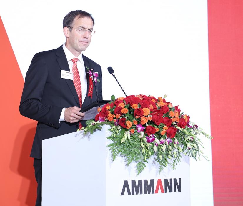 Hans-Christian Schneider, CEO of the Ammann Group, speaking at the opening ceremony
