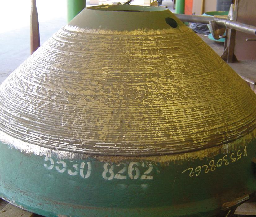 Crusher cone with wearfacing applied