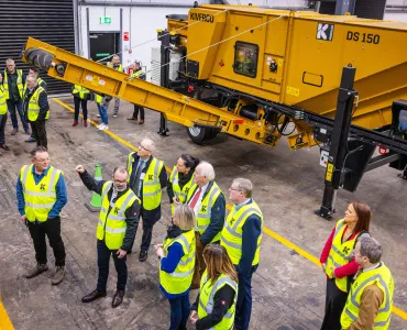 Attendees at the event being shown around Kiverco’s newly extended facilities and some of the recycling machinery on display  