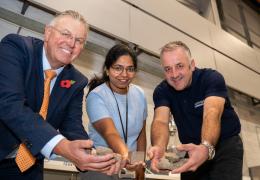 Scott Bros directors Bob Borthwick (left) and Peter Scott (right) with structural engineering lecturer Dr Thadshajini Suntharalingam with samples of the waste clay that make up the prototype bricks