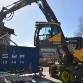 The Volvo EW200E MH material handler is engineered to deliver strong performance in waste-handling applications
