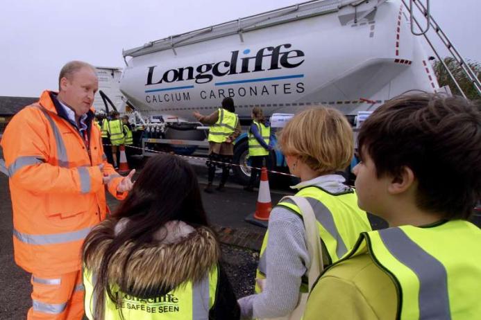 Longcliffe managing director Paul Boustead talking to students about road safety