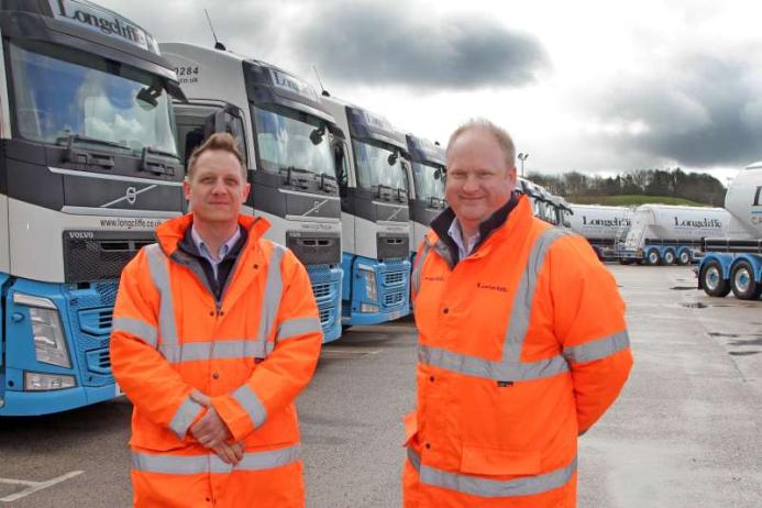 Celebrating the new fleet, logistics manager James Hopkinson (left) with Longcliffe managing director Paul Boustead