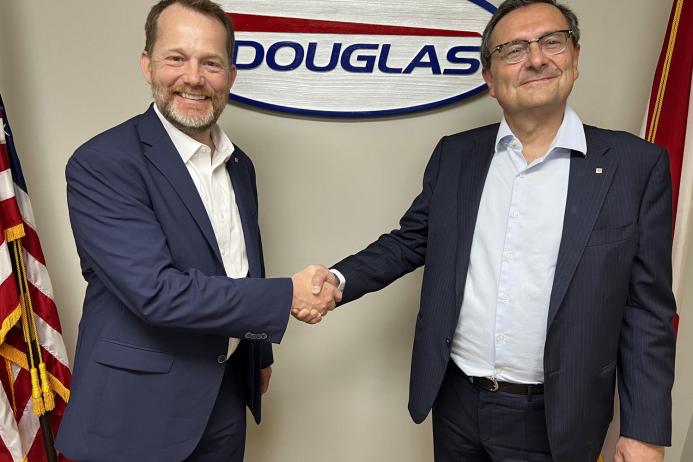L-R: Paul Ross, president of Douglas Manufacturing, with Fabio Ghisalberti, executive vice-president of Rulmeca 