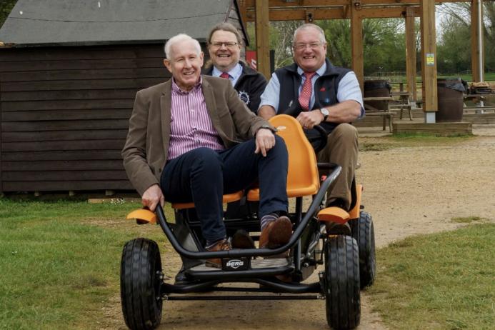 L-R: Paul Hazel and Matthew Millett from Cotswold Lakes Trust with Peter Andrew from The Hills Group in a go-kart at Cotswold Country Park & Beach in the Cotswold Water Park