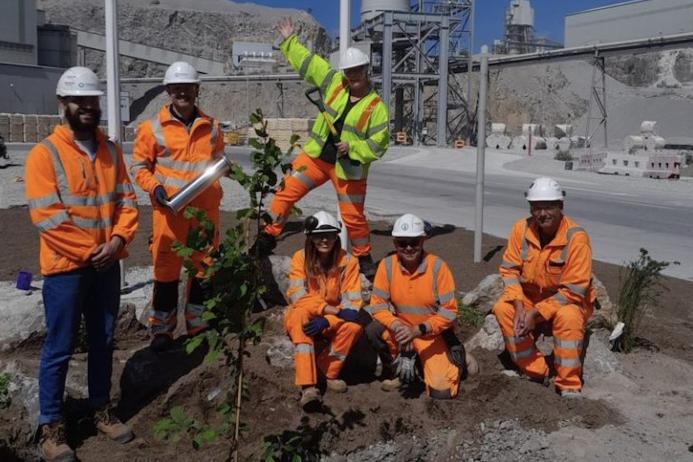 Tunstead employees planted native trees and shrubs in a new green space located on site