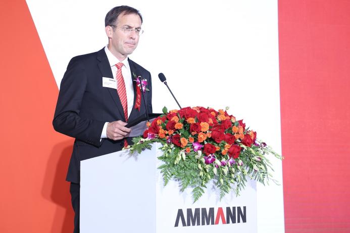Hans-Christian Schneider, CEO of the Ammann Group, speaking at the opening ceremony