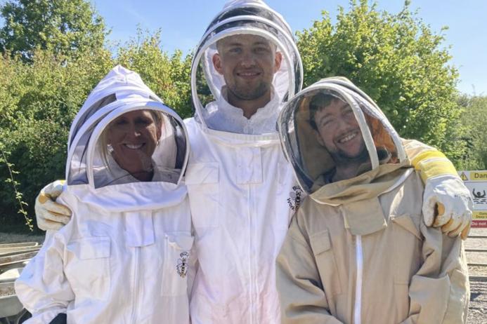 Company tanker driver and amateur beekeeper Bruce Stokes (centre) has donated three hives of bees to support the biodiversity of the Ketton cement works site
