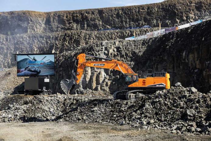 Develon demonstrating their DX800LC-7 crawler excavator at steinexpo