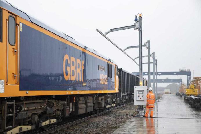 Tarmac have trialled an innovative overhead loading system which allows the electricity lines supplying locomotives to be temporarily removed while loading takes place