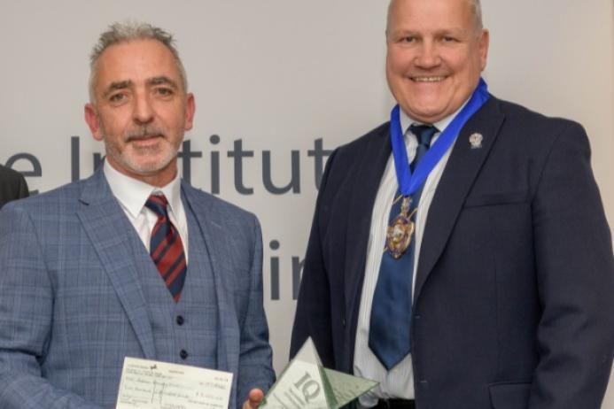 Emerald Challenge winner Andrew Gail (left) with IQ President Viv Russell