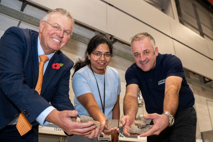 Scott Bros directors Bob Borthwick (left) and Peter Scott (right) with structural engineering lecturer Dr Thadshajini Suntharalingam with samples of the waste clay that make up the prototype bricks