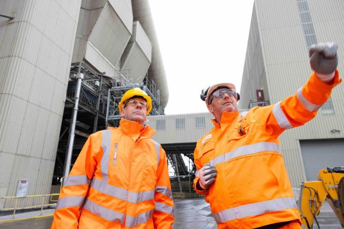 Lord Callanan, UK Minister for Energy Efficiency and Green Finance, being shown around Rugby cement works