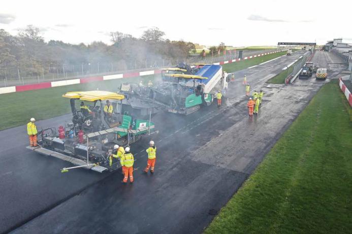 AI team resurfacing the new race track at the iconic Donington Park race circuit