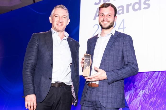 Sam Farnsworth (right) accepting the Customer Success Award for Excellence in Analytical Insights from Pete Wilkinson, managing director of Esri UK