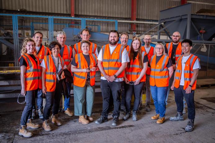 Liz Gilligan and Sam Clark (centre) with the Material Evolution team