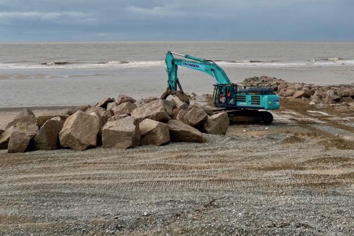 Rock armour is being strategically placed to create groynes at Rossall Beach