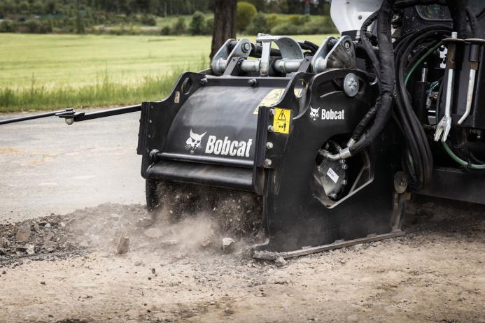 A Bobcat road-planer attachment
