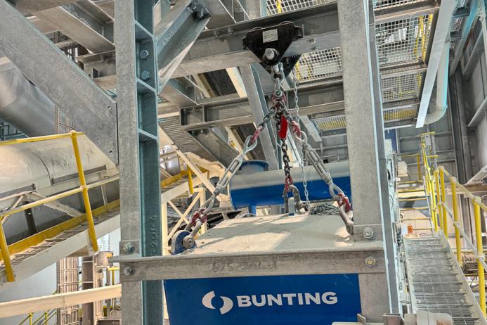 The Bunting suspension electro magnet is connected to a hand-geared travelling trolley installed by Atherton Material Handling