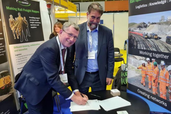 L-R: Neil Sime, managing director of Victa Railfreight, and Mark Grimshaw-Smith, rail and sea manager at Cemex UK