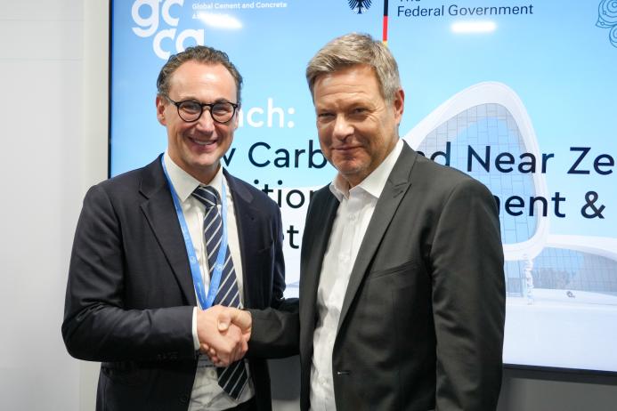 Thomas Guillot, chief executive of the GCCA (left), and German Vice Chancellor and Federal Minister for Economic Affairs and Climate Action, Robert Habeck (right)