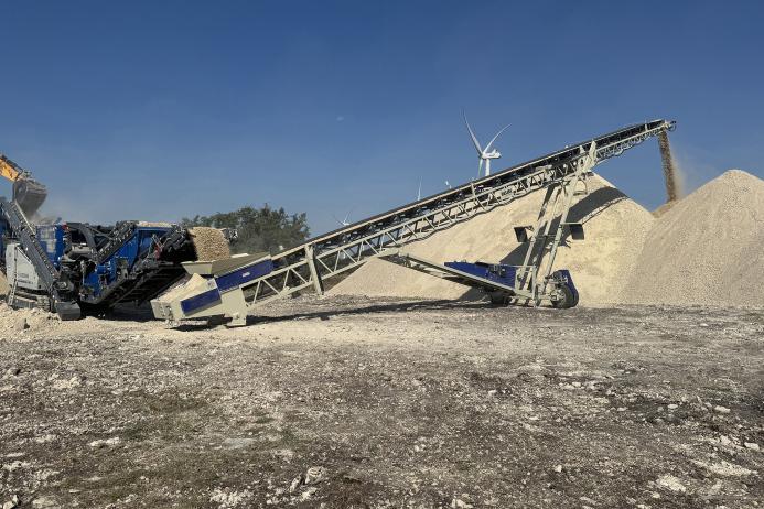 A Masaba self-contained hydraulic radial stacking conveyor
