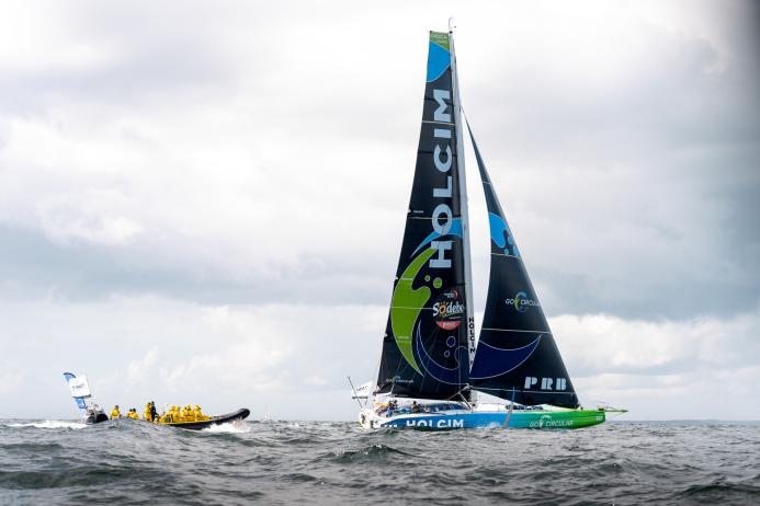 Holcim-PRB’s GO CIRCULAR heading out to the start line of the Vendée Globe round-the-world yacht race 