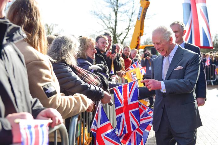 His Majesty meeting flag-waving employees at JCB World Headquarters