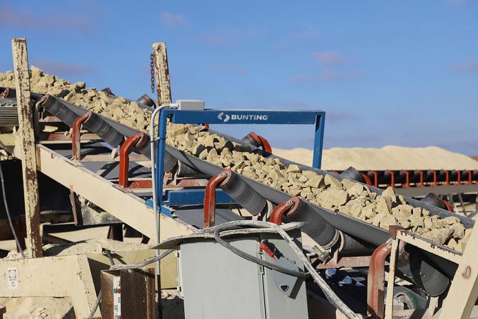 Bunting TN77 metal detector operating in an aggregate quarry