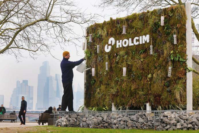 Holcim UK’s environmentally friendly ‘Sustaina-billboard’, containing pollinating flowers, plants and seeds to support local wildlife, and a surrounding frame made from low-carbon concrete and recycled aggregate