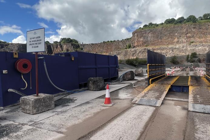 Fig. 2. Hired wheel wash unit with rumble strip ramps and pressurized spray