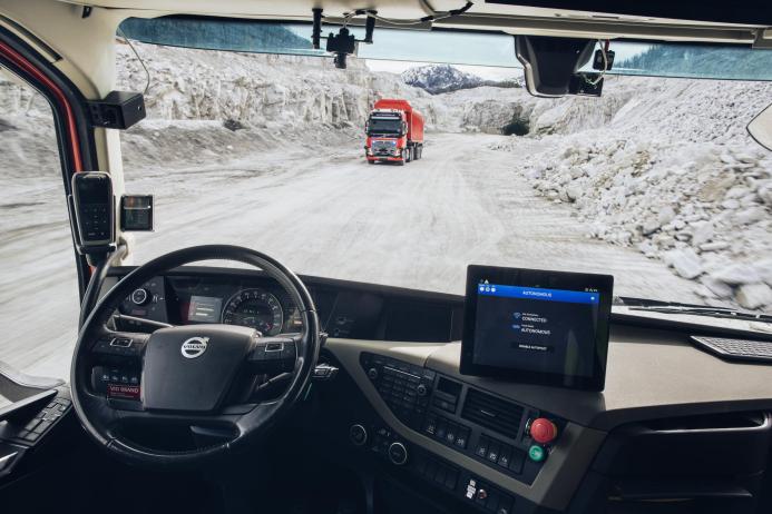 The trucks operate under challenging conditions, efficiently navigating a 5km route between the mine and crusher, which includes steep inclines and tunnels