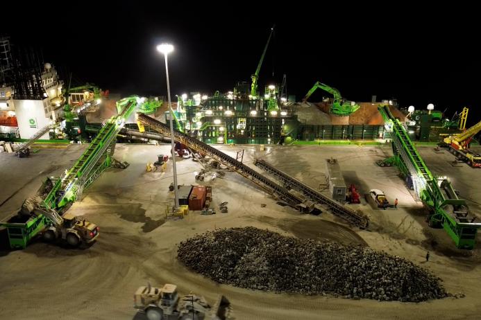 Telestack have supplied two AP 1500 D3 wheel-mounted apron feeders and two TB 52 track-mounted radial telescopic boom conveyors for high-rate loading of DEME’s specialized rock armour installation vessels