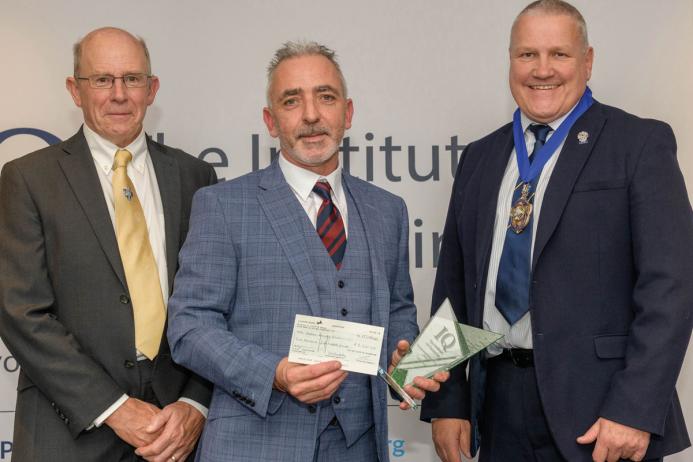 L–R: Steve Cole Hon FIQ, Andrew Gall of Silt Pump, and Viv Russell Hon FIQ