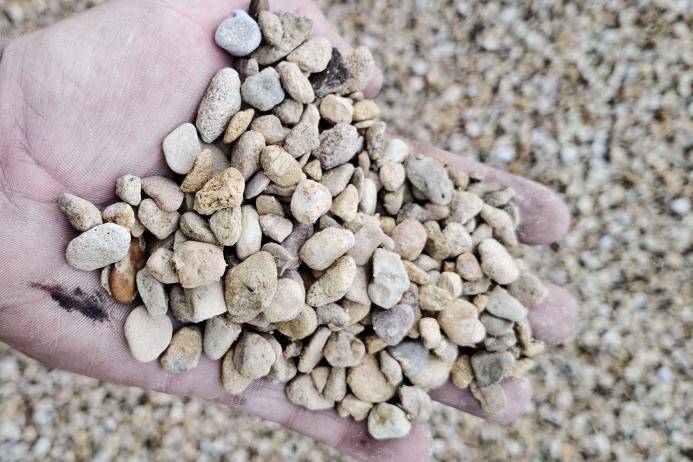 Limestone pebbles prior to crushing