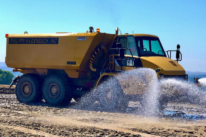 HiVol water tanks for the Cat 730 are fitted with two spray heads, a 1,500-gal/minute pump and the necessary plumbing for a water cannon if customers want to add one