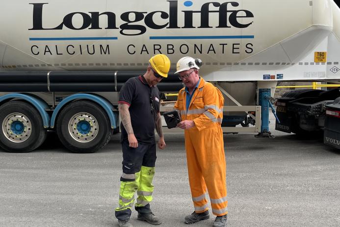 L-R: Michael Mosely, warehouse and planning team leader at IKO, and Longcliffe driver Chris Pugh