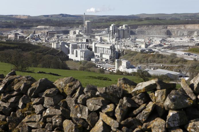 Carbon dioxide emissions generated by the UK concrete and cement sector are now 63% lower than 1990 levels