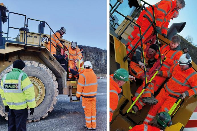 Cauldon Low - Left: two people manoeuvring a full body manikin along a walkway and down steps from an elevated cab; Right: four people using the cab extrication method to get a ‘real’ casualty from the cab to the ground