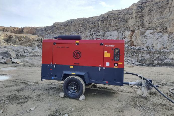 Maa Kripa’s Chicago Pneumatic CPS 550-200 portable air compressor powers drilling and blasting operations in the rugged terrain of Rajasthan, India