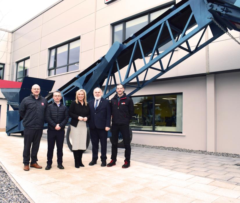 L-R: Dominic Molloy, Chair of Mid Ulster Council; Sean Loughran, Powerscreen business line director and general manager of Terex Dungannon; First Minister Michelle O’Neill; Francie Molloy, Sinn Fein; and Conor Kennedy, operations director at Terex Dungannon in front of the MK1, one of Powerscreen’s first machines 