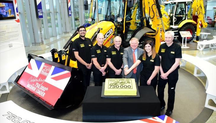 L-R: JCB backhoe loader employees Nihal Dhillon, Phil Starbuck, John Plant, JCB chairman Lord Bamford, Shannon Ramczykowski and Keith Bloor celebrating production of the 750,000th JCB backhoe loader at JCB World HQ in Rocester, Staffordshire 750,000th JCB backhoe loader