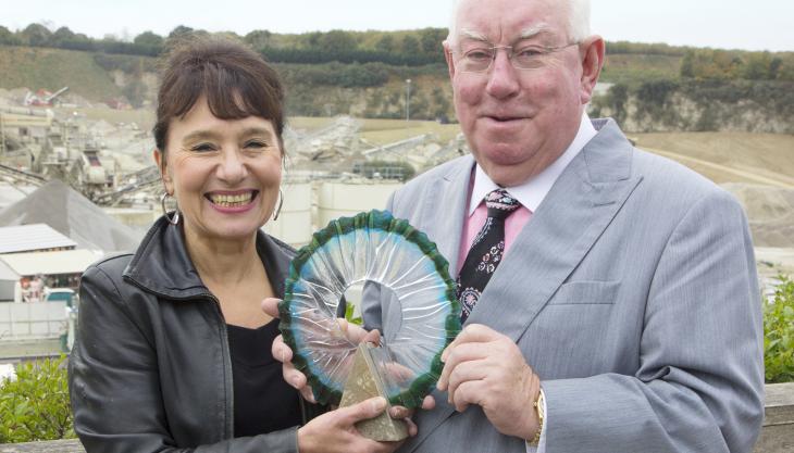 Artist Annie Ross with Pat Gallagher and one of the trophies Annie Ross and Pat Gallagher