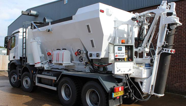 A volumetric concrete mixer truck