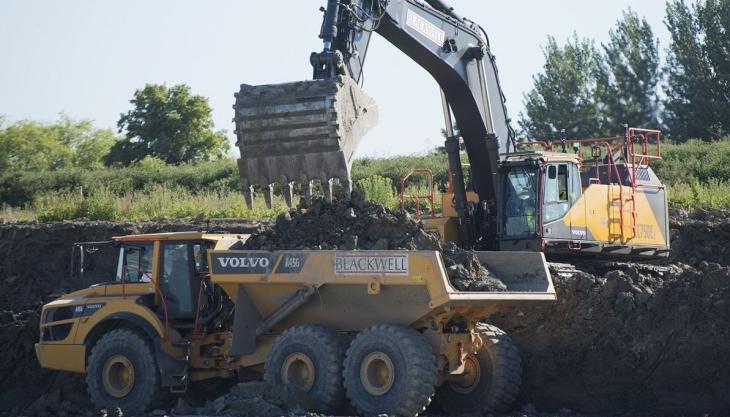 Volvo EC750E excavator loading an A45G articulated hauler Blackwell Volvos