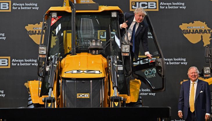 Prime Minister Boris Johnson pictured with JCB chairman Lord Bamford at JCB India’s new £100 million factory in Gujarat JCB India