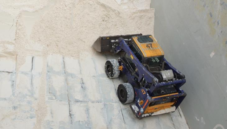 One of ZHD’s modified Bobcat skid-steers at work in a ship’s hold Bobcat skid-steer