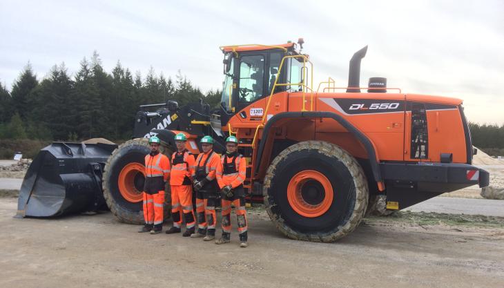 CEMEX’s La Ventrouze site manager Romain Legrand and his team with their new DL550-5 wheel loader CEMEX team at La Ventrouze in France with the new Doosan DL550-5 wheel loader